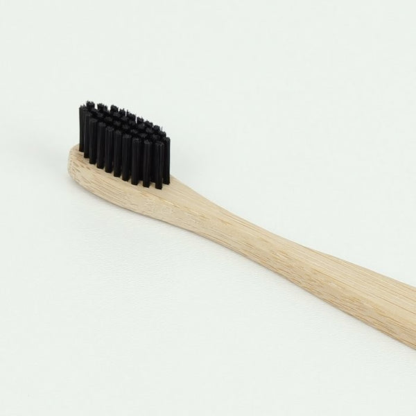 Bamboo Toothbrush with Charcoal & Nylon Bristles (Adult), by Curanata  £3.75 The Contented Company ecofriendly zerowaste
